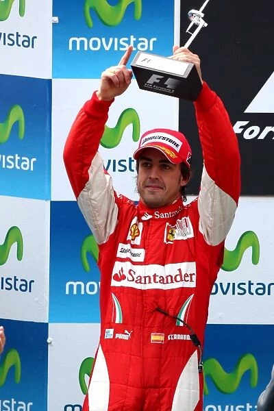 Formula One World Championship: Second placed Fernando Alonso Ferrari on the podium