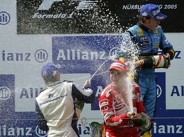 Formula One World Championship: Second placed Nick Heidfeld Williams; Race winner Fernando Alonso Renault and third placed Rubens Barrichello