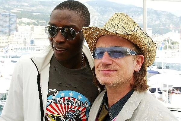 Formula One World Championship: Shola Ameobi, Newcastle FC with Bono lead singer U2