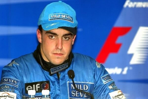 Formula One World Championship: A sick Fernando Alonso Renault R23 in the press conference following his third place finish