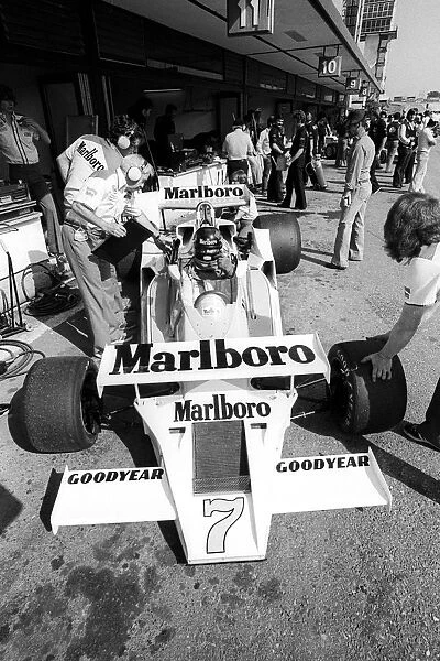 Formula One World Championship: Sixth placed James Hunt McLaren M26 experiments with an unusual front wing configuration during practice