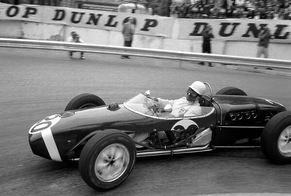 Formula One World Championship: Stirling Moss drove one of his greatest races in the under-powered Rob Walker Lotus 18 to take victory in the