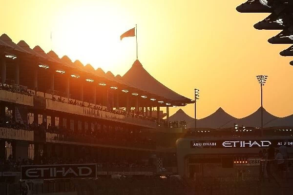 Formula One World Championship: Sun sets over the circuit in qualifying