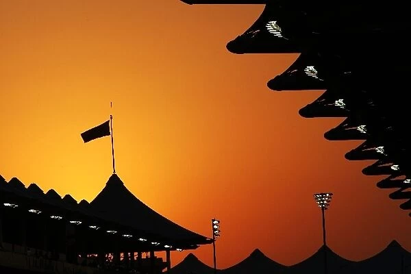 Formula One World Championship: Sun sets over the circuit during qualifying