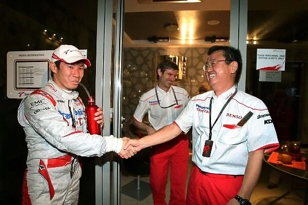 Formula One World Championship: Tadashi Yamashina Toyota F1 Chairman congratulates Kamui Kobayashi Toyota on his first points finish
