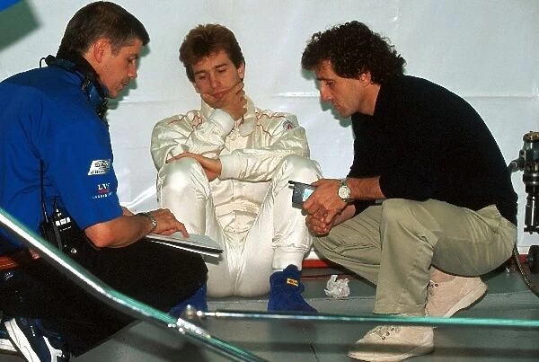 Formula One World Championship: Team owner Alain Prost gives instructions to Jarno Trulli, who was drafted in to the Prost team as a replacement