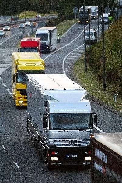 Formula One World Championship: Team transporters, led by McLaren, leave Heston Services on the M4 en route from Magny Cours to Silverstone