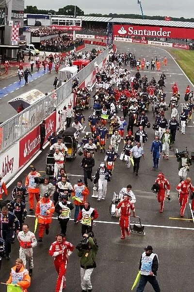 Formula One World Championship: The teams clear from the grid