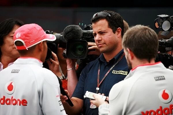 Formula One World Championship: Ted Kravitz BBC Television Pitlane Reporter interviews Lewis Hamilton McLaren