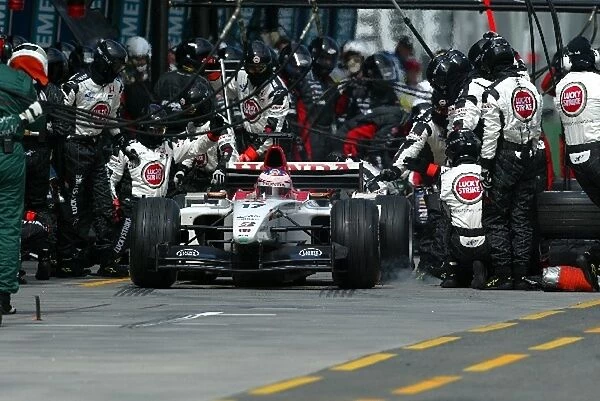 Formula One World Championship: Tenth placed Jenson Button BAR Honda 005 makes his embarrasing pit stop after being held up by team