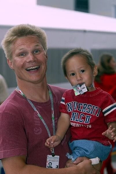 Formula One World Championship: Former Toyota driver Mika Salo with his son Max