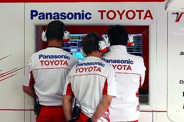 Formula One World Championship: Toyota mechanic in the pits