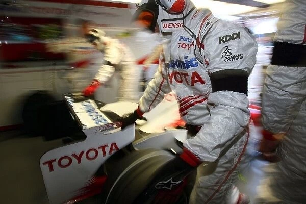 Formula One World Championship: Toyota mechanics during qualifying
