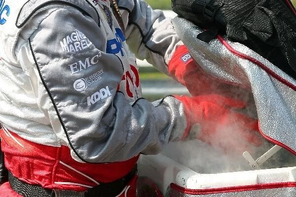 Formula One World Championship: Toyota mechanics with dry ice