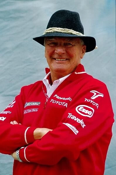 Formula One World Championship: Toyota President Ove Andersson tries out some traditional Austrian head gear