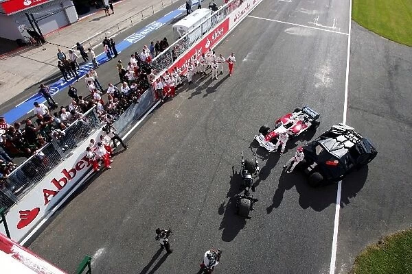 Formula One World Championship: Toyota team with the Batmobile and the Batpod