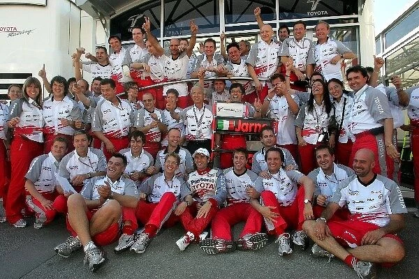 Formula One World Championship: The Toyota team celebrate third and fourth place finishes