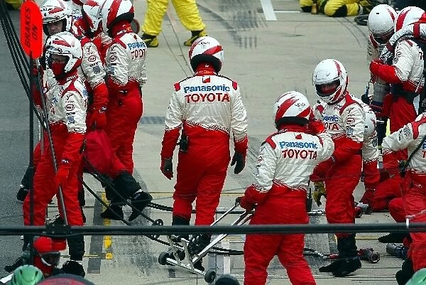 Formula One World Championship: The Toyota team make a pitstop