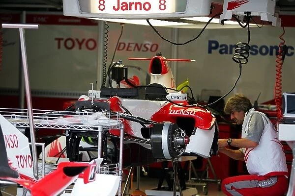 Formula One World Championship: Toyota TF106 of Jarno Trulli Toyota in the pits