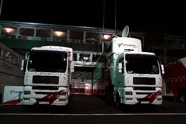 Formula One World Championship: Toyota trucks at night