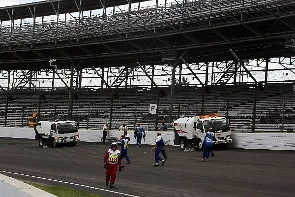 Formula One World Championship: The track is cleared after the crash of Ralf Schumacher Toyota