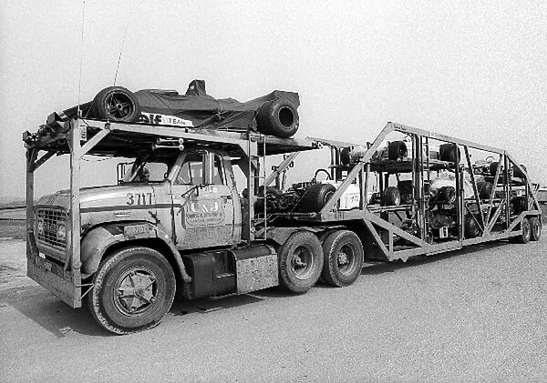 Formula One World Championship: A transporter carrying some of the competing cars to the circuit