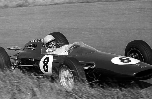 Formula One World Championship: Trevor Taylor Lotus 25 was classified tenth despite only completing 66 of the scheduled 80 laps