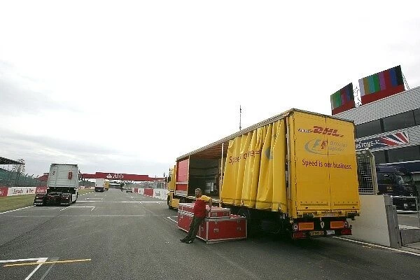 Formula One World Championship: Trucks on the pit straight