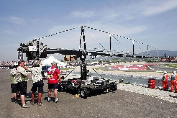Formula One World Championship: A TV camera on a Panavision camera grip