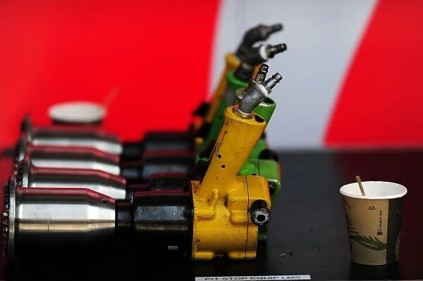 Formula One World Championship: Tyre changing air guns and a cup of coffee