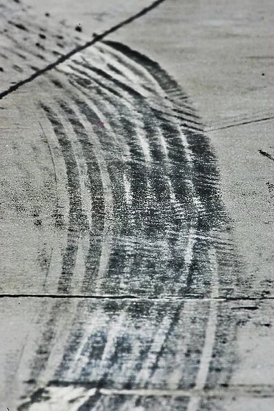 Formula One World Championship: Tyre marks on the pit road