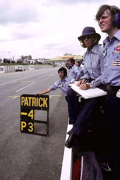 Formula One World Championship: The Tyrrell team hang out a pit board for Patrick Depailler Tyrrell, who finished the race in third position