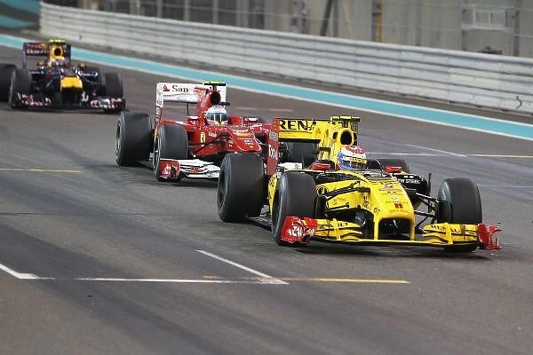 Formula One World Championship: Vitaly Petrov Renault R30 leads Fernando Alonso Ferrari F10