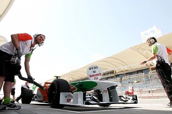 Formula One World Championship: Vitantonio Liuzzi Force India F1 VJM03 in the pits