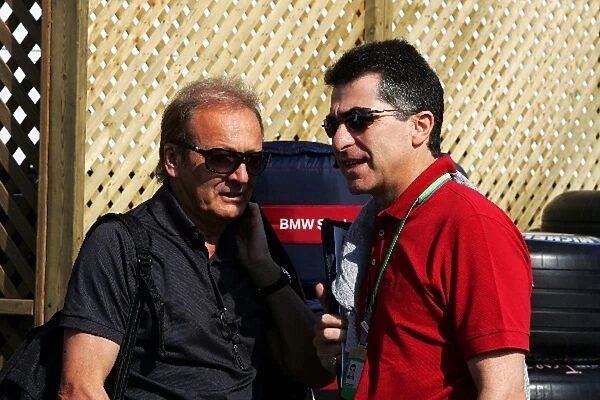Formula One World Championship: Werner Heinz Driver manager of Nick Heidfeld BMW Sauber F1 talks with Julian Jakobi