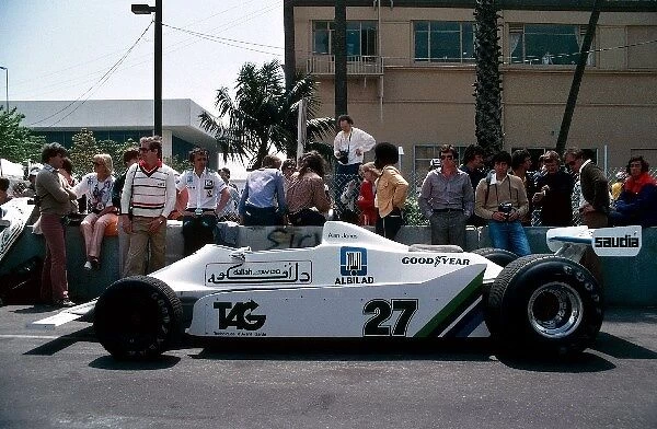 Formula One World Championship: The Williams FW07 of Alan Jones stands in the pitlane during practice. Jones finished the race in third position