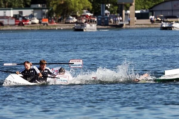Formula One World Championship: Williams and Lotus take part in a boat race on the rowing lake