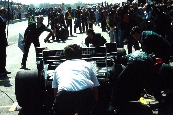 Formula One World Championship: The Williams team make a pit stop