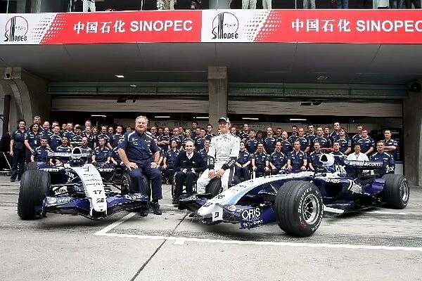 Formula One World Championship: Williams team picture with Patrick Head Williams Director of Engineering, Frank Williams Williams Team Owner