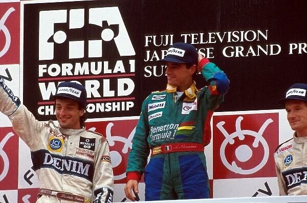 Formula One World Championship: Winner Alessandro Nannini, on the podium with 2nd place Riccardo Patrese and 3rd place Thierry Boutsen