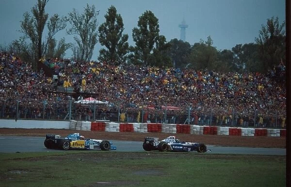 Formula One World Championship: Winner Damon Hill Williams FW17 is chased by 3rd placed Michael Schumacher Benetton B195