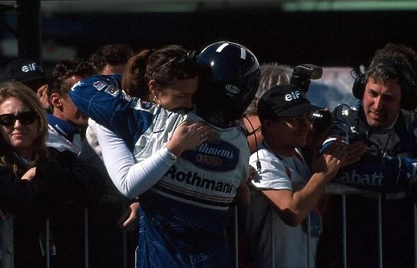 Formula One World Championship: Winner Damon Hill Williams FW18 is greeted by his wife Georgie