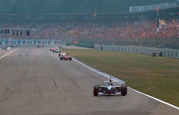 Formula One World Championship: Winner Damon Hill Williams FW18 leading Schumacher on his way to his 7th win of the year