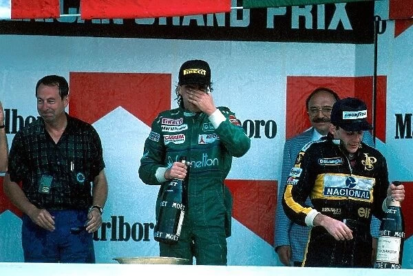 Formula One World Championship: Winner Gerhard Berger, 2nd place Alain Prost and 3rd place Ayrton Senna celebrate on the podium