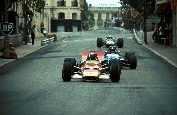 Formula One World Championship: Winner Graham Hill, Lotus 49B leads Jean Pierre Beltoise, Matra MS80