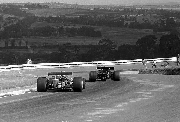Formula One World Championship: Winner Jack Brabham Brabham BT33 chases Jackie Stewart March 701