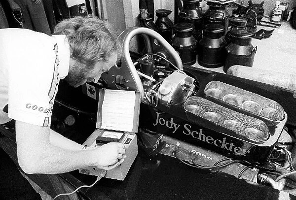 Formula One World Championship: A Wolf mechanic uses a Castrol Vapour Lock Indicator on the Wolf WR5 of Jody Scheckter