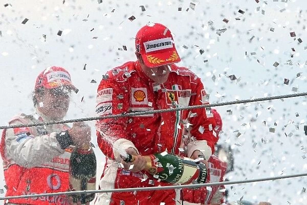 Formula One World Championship: World Champion Kimi Raikkonen Ferrari on the podium