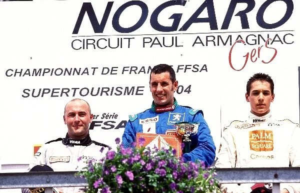 French Touring Car Championship: The race two podium: Jean Philippe Dayraut Opel 2nd, Soheil Ayari Peugeot 1st and Julien Gilbert SEAT 3rd