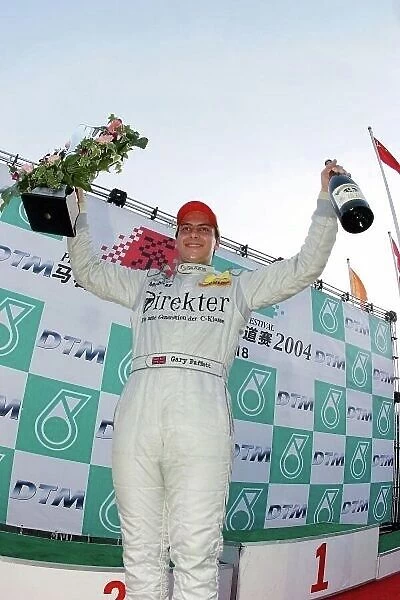 DTM. Gary Paffett (GBR), AMG Mercedes Benz, won the first DTM race to be held in China.